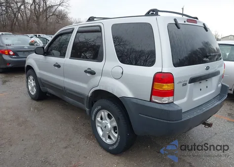 2003 Ford Escape Xlt z USA, uszkodzony, nr VIN 1FMYU931X3KB80592